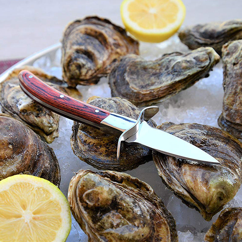 Stainless steel oyster knife with cut resistant gloves