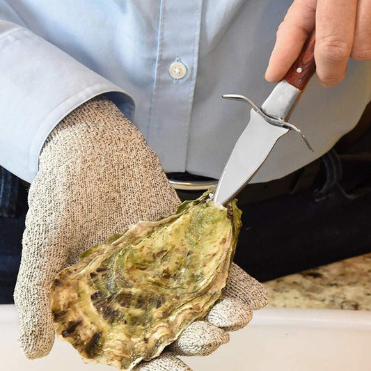 Stainless steel oyster knife with cut resistant gloves