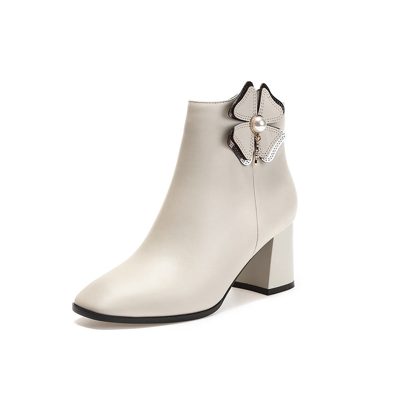 Europe and the United States women's 2020 new winter boots leather shoes with thick heels leather tendon boots female